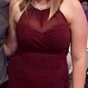 Floor length cranberry colored bridesmaid dress